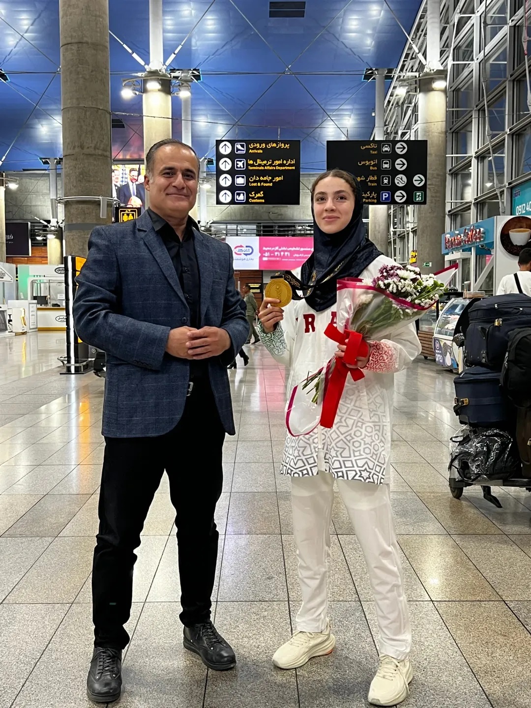 عکس روژان بهنامی قهرمان موی تای